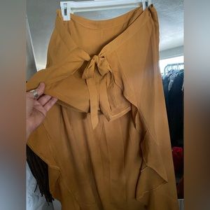 Mustard color shorts with train skort situation